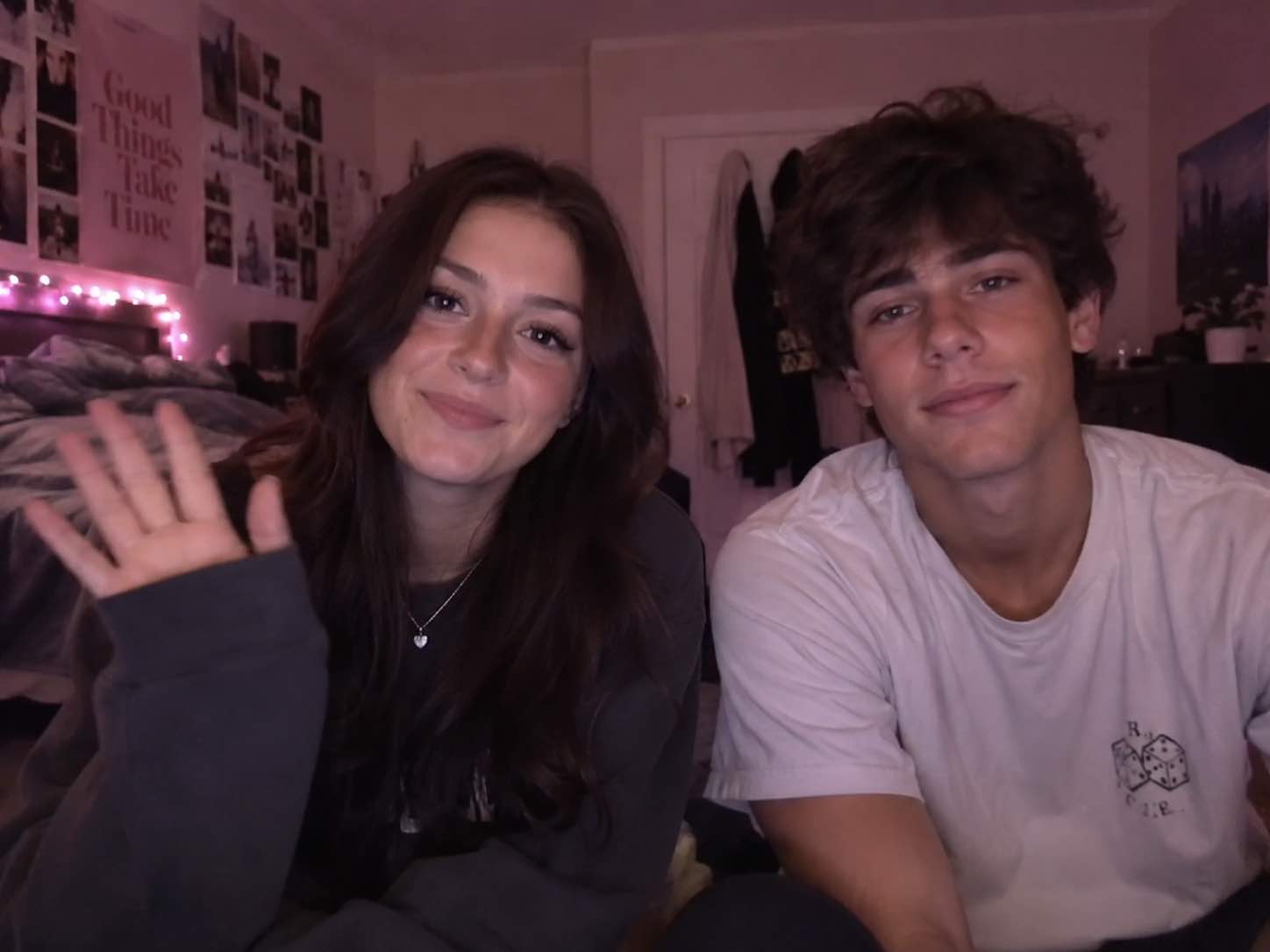 Two people smiling at the camera